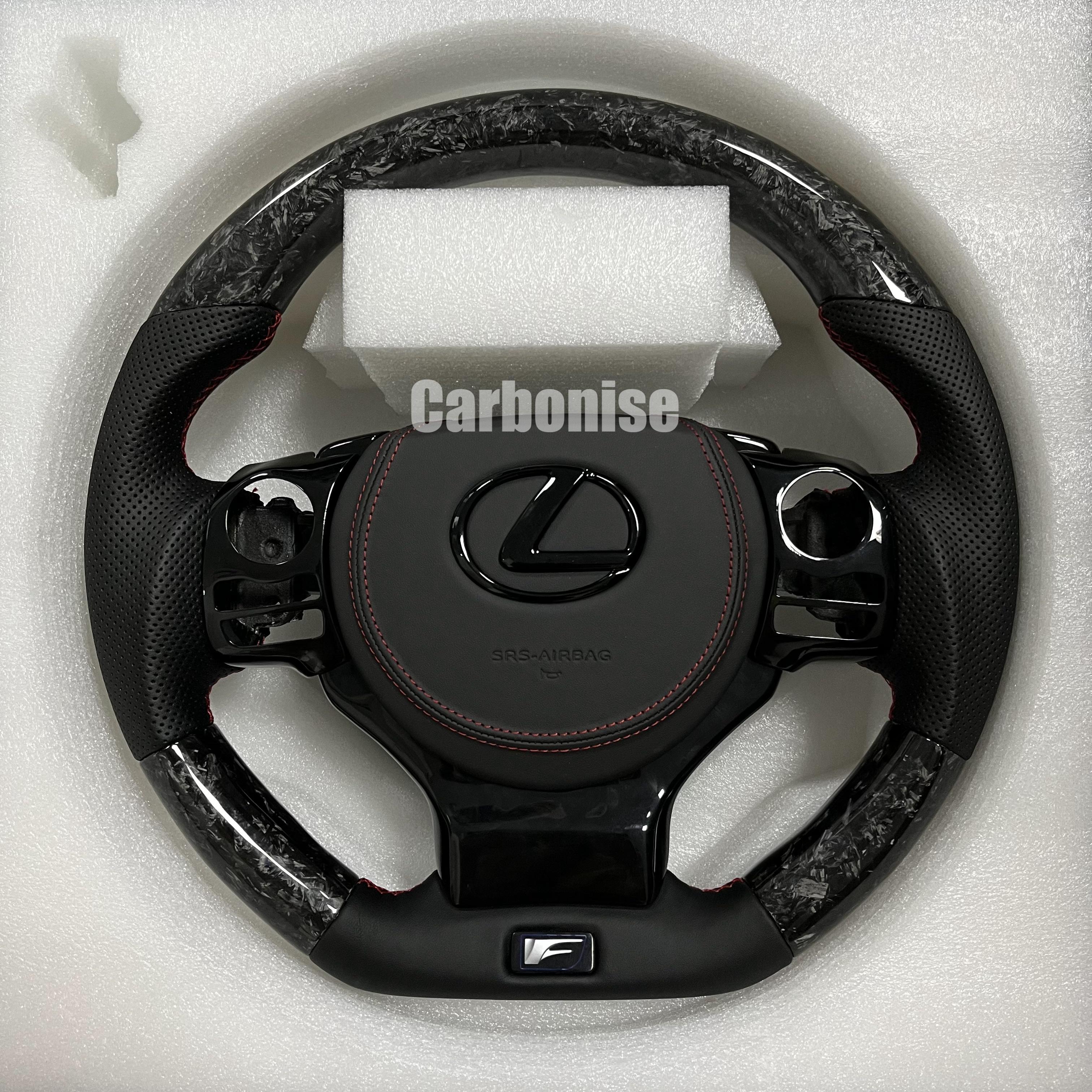 Carbonise Lexus forged carbon steering wheel with perforated leather grips and red stitching