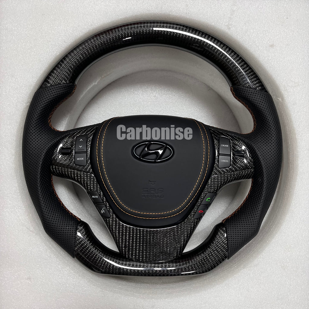 Carbonise carbon fiber steering wheel with perforated leather grip and OEM buttons
