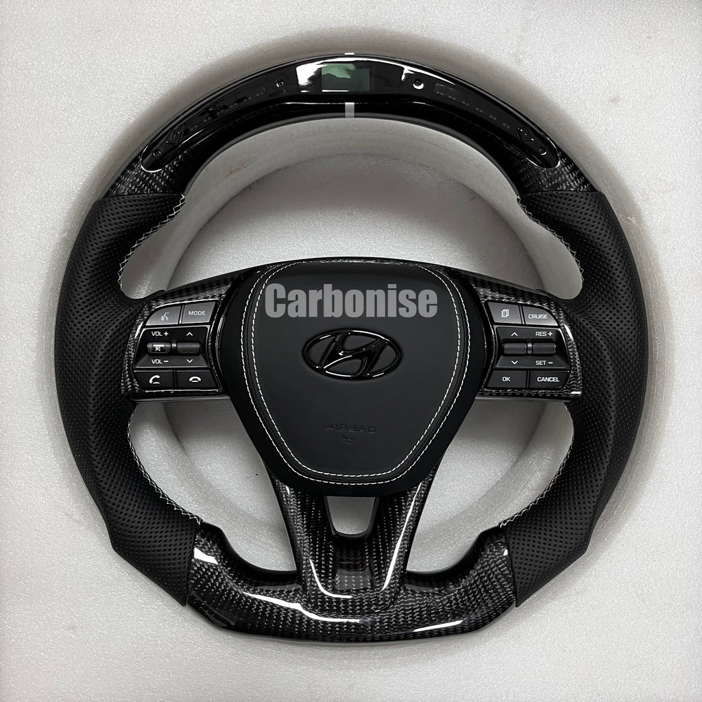 Carbonise Hyundai carbon fiber steering wheel with perforated leather grip and OEM buttons