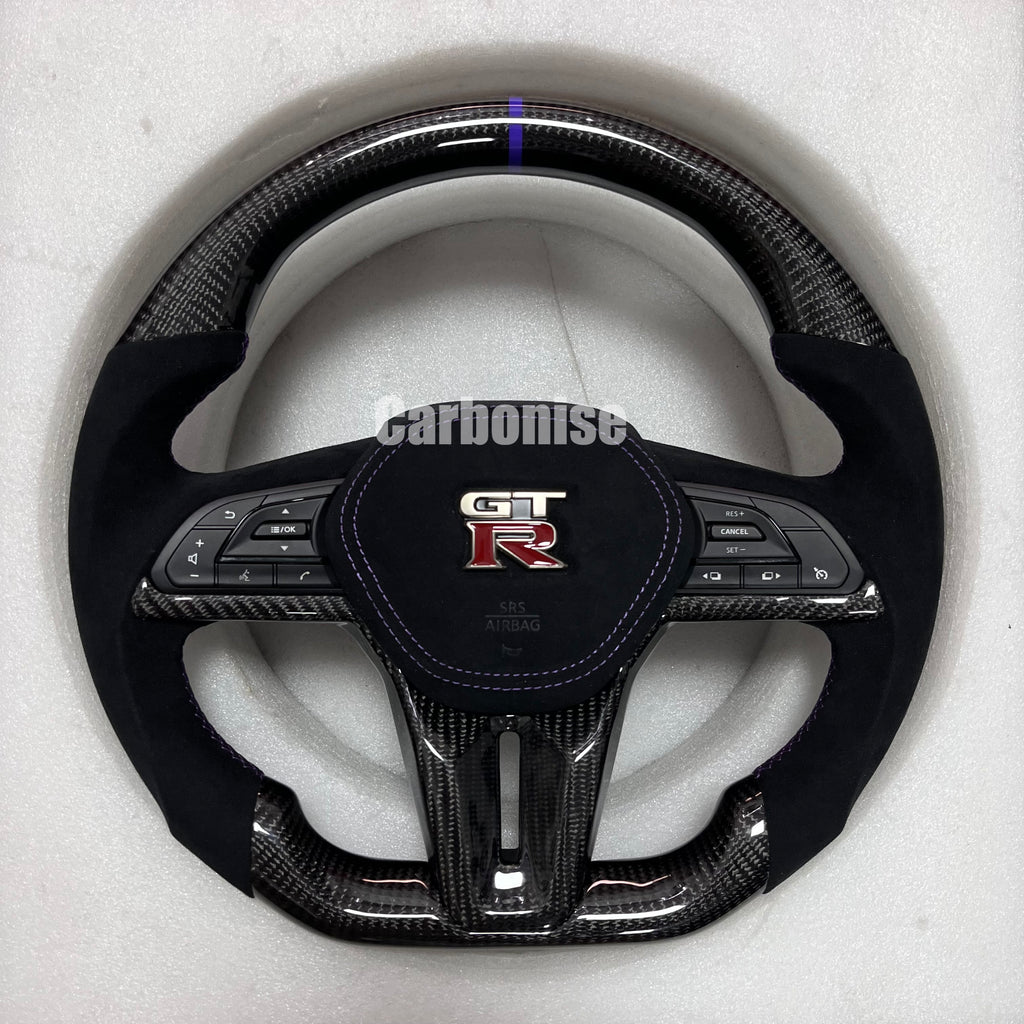 Carbonise Nissan GT-R carbon fibre steering wheel with Alcantara grips and purple center stripe, airbag cover alcantara