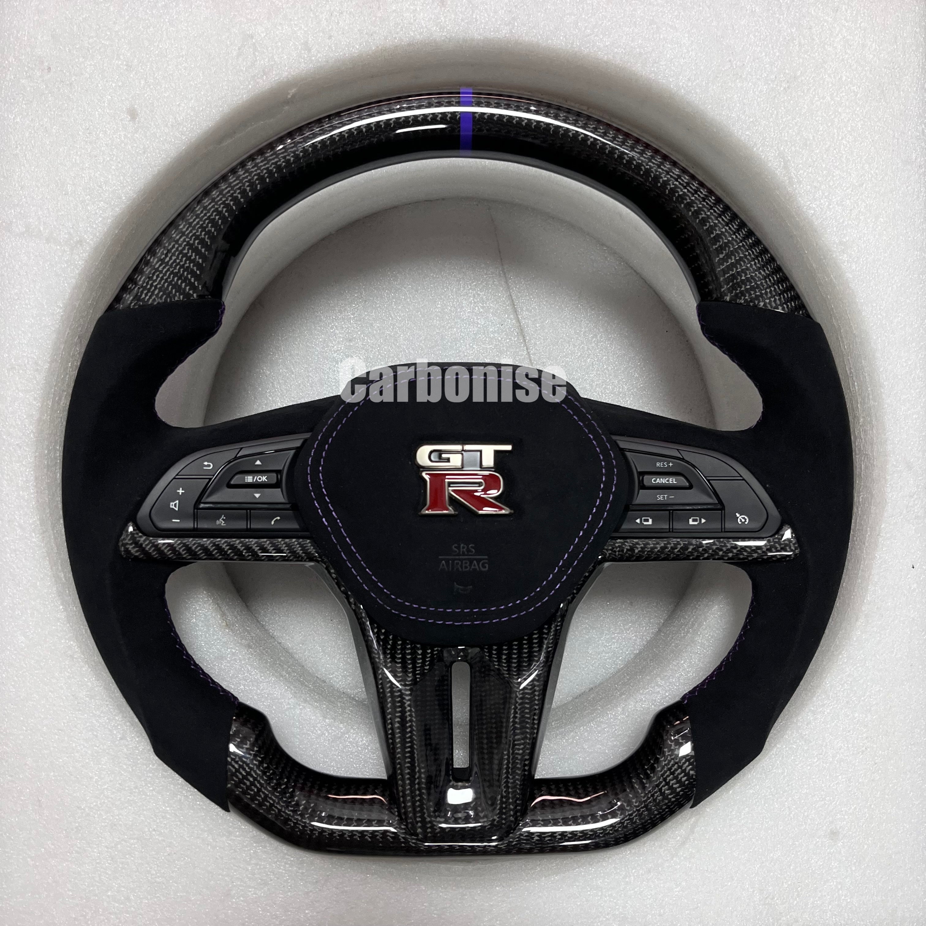 Carbonise Nissan GT-R carbon fibre steering wheel with Alcantara grips and purple center stripe, airbag cover alcantara