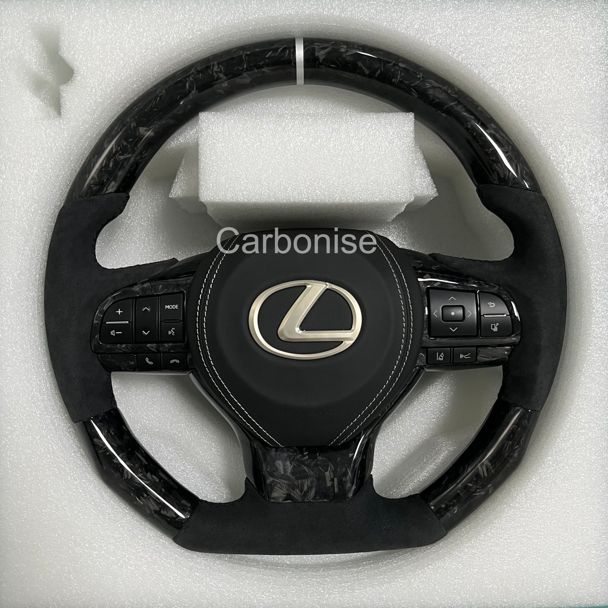 Carbonise Lexus forged carbon steering wheel with Alcantara grips and forged carbon finish