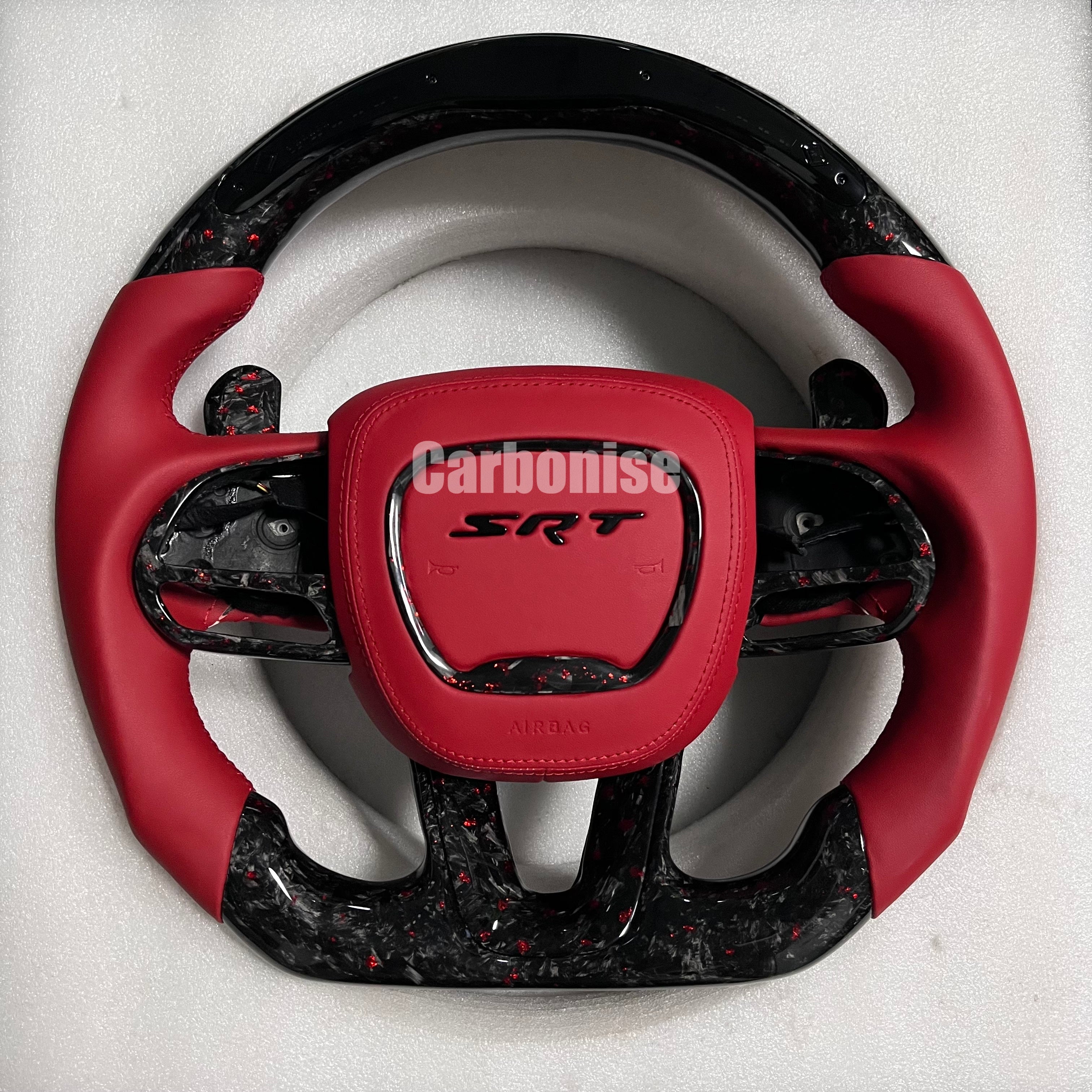 Carbonise Dodge SRT forged carbon steering wheel with red flake carbon and red leather grip.

Led Shift light
