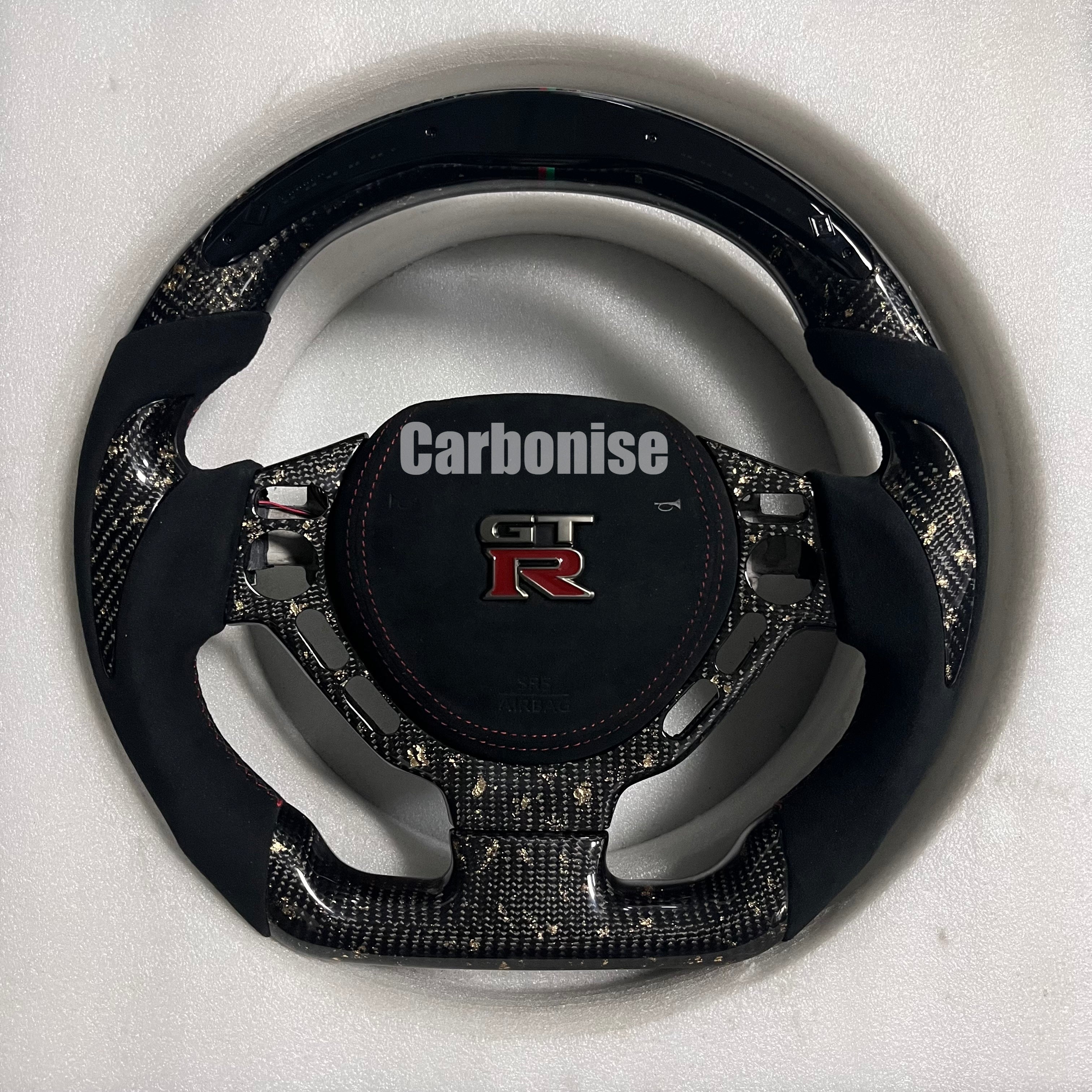 Carbonise Nissan GT-R forged carbon steering wheel with Alcantara grips

Led Shift light