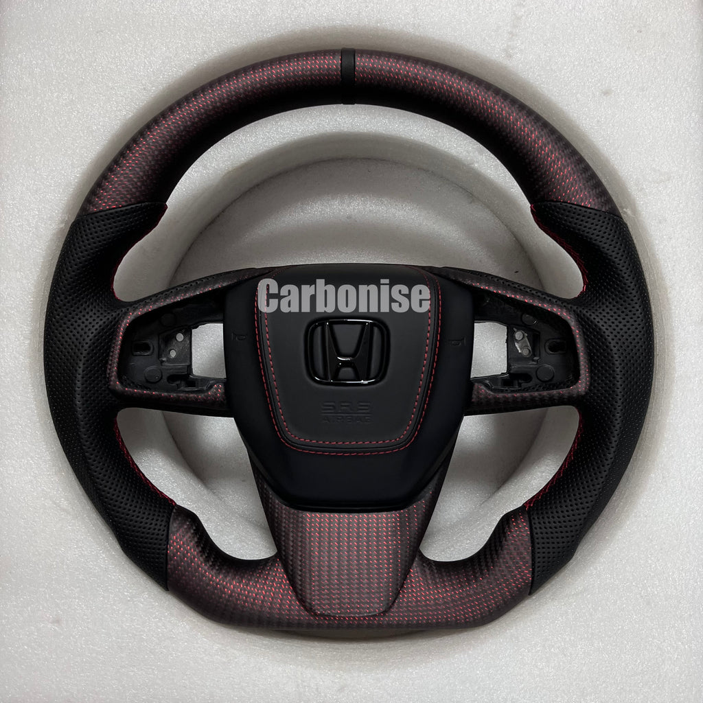 Custom Honda steering wheel with red forged carbon finish, perforated black side grips, red stitching, and OEM airbag compatibility.