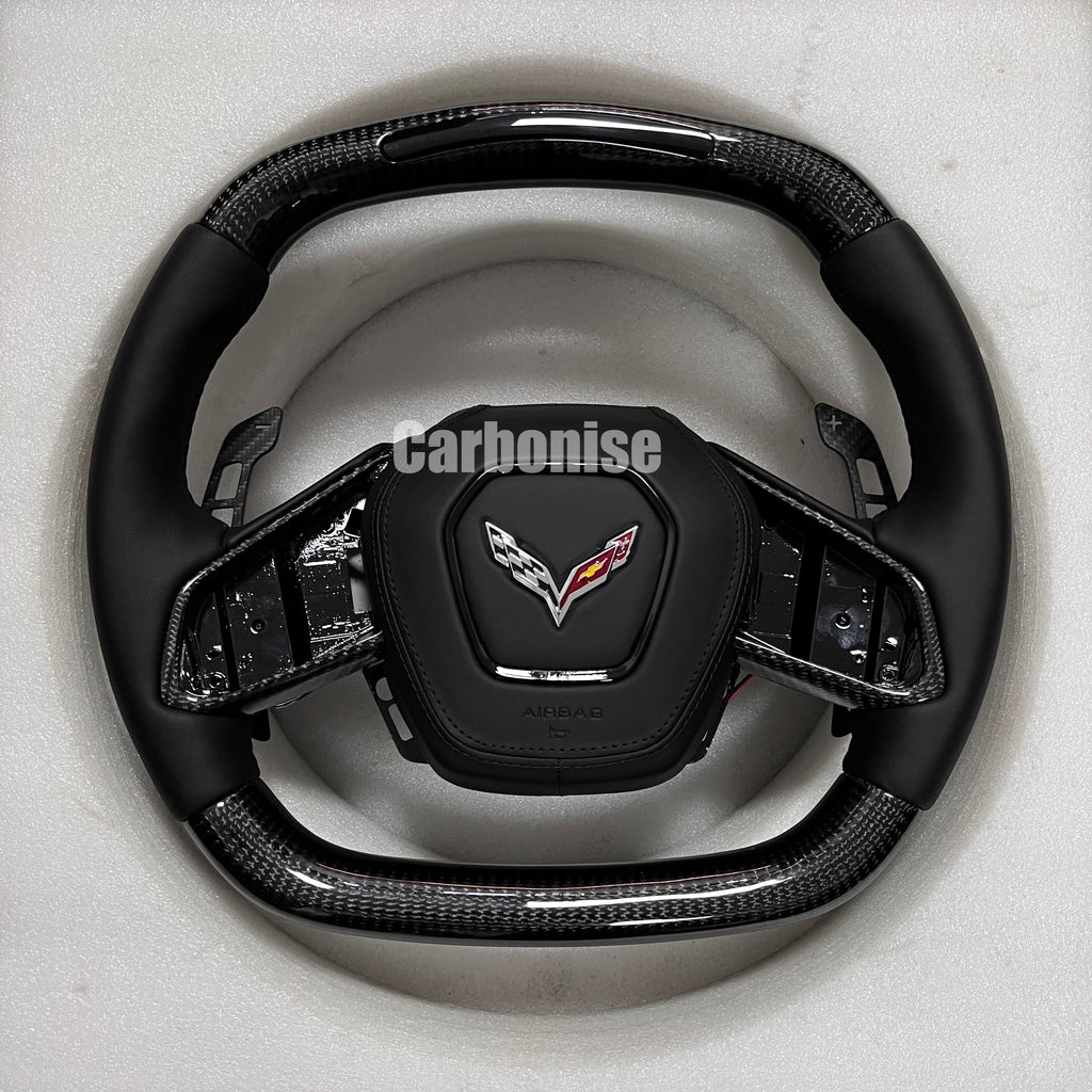 Carbonise Corvette carbon fiber steering wheel with black leather grip

also led shift light
