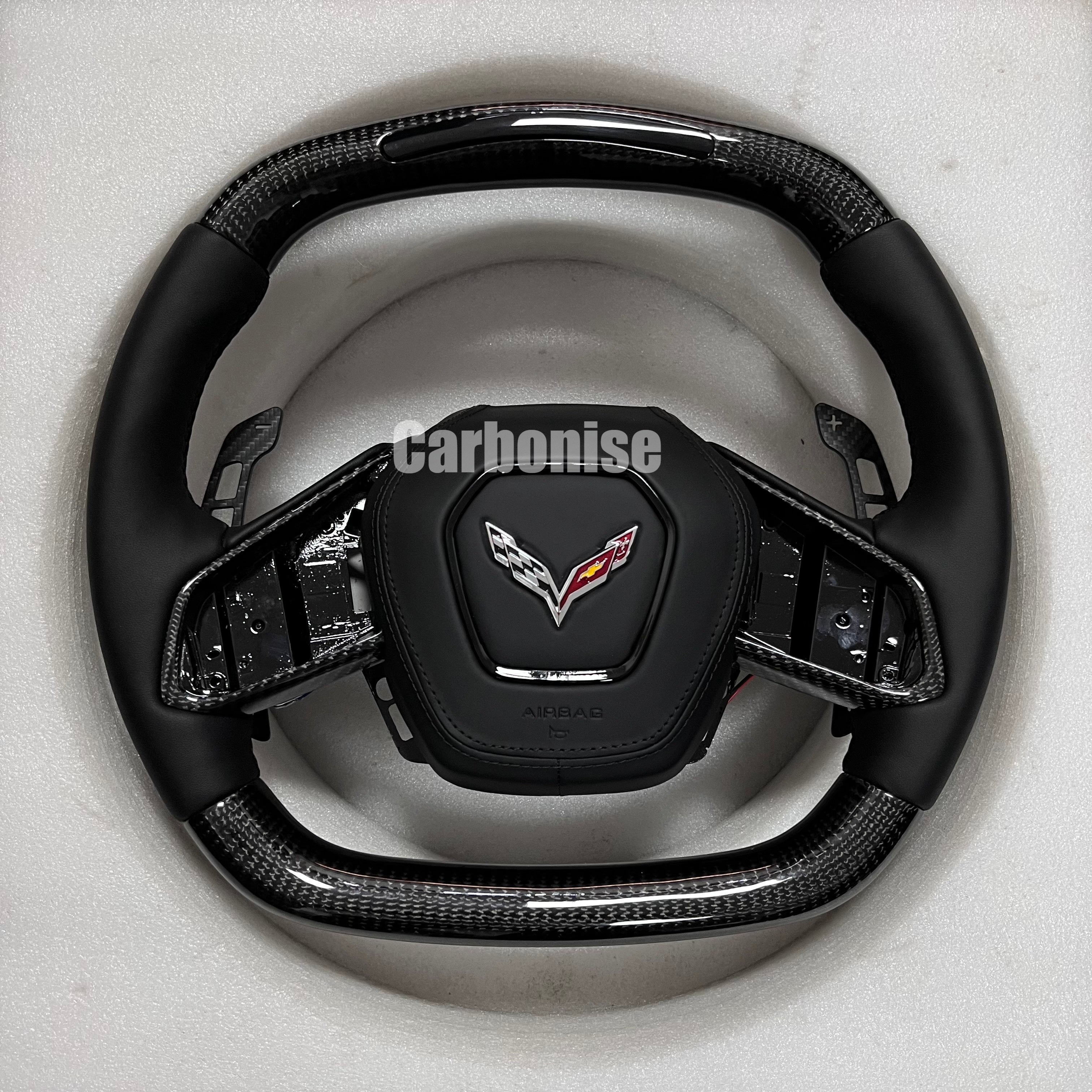 Carbonise Corvette carbon fiber steering wheel with black leather grip

also led shift light