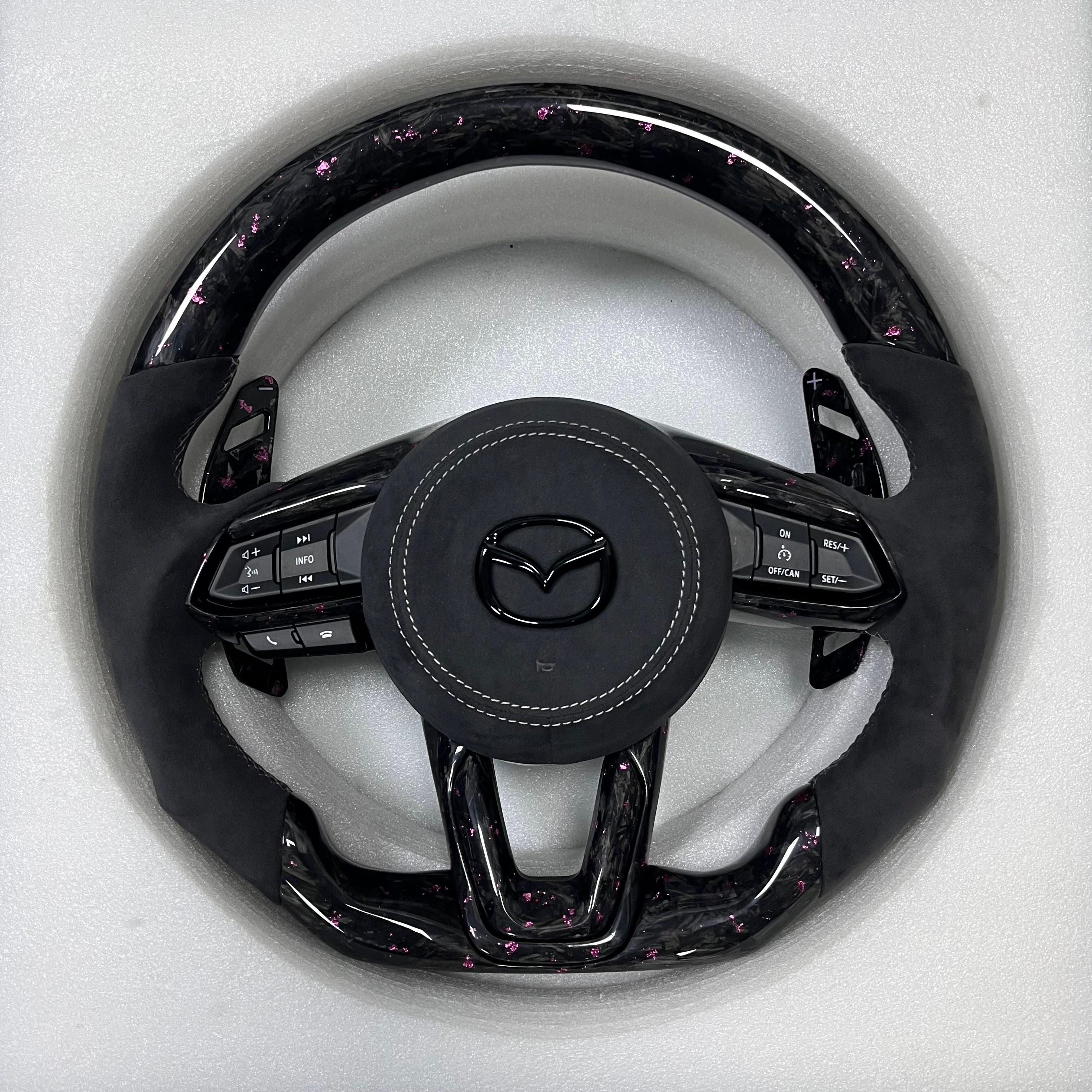 Carbonise Mazda pink forged carbon steering wheel with black Alcantara grip