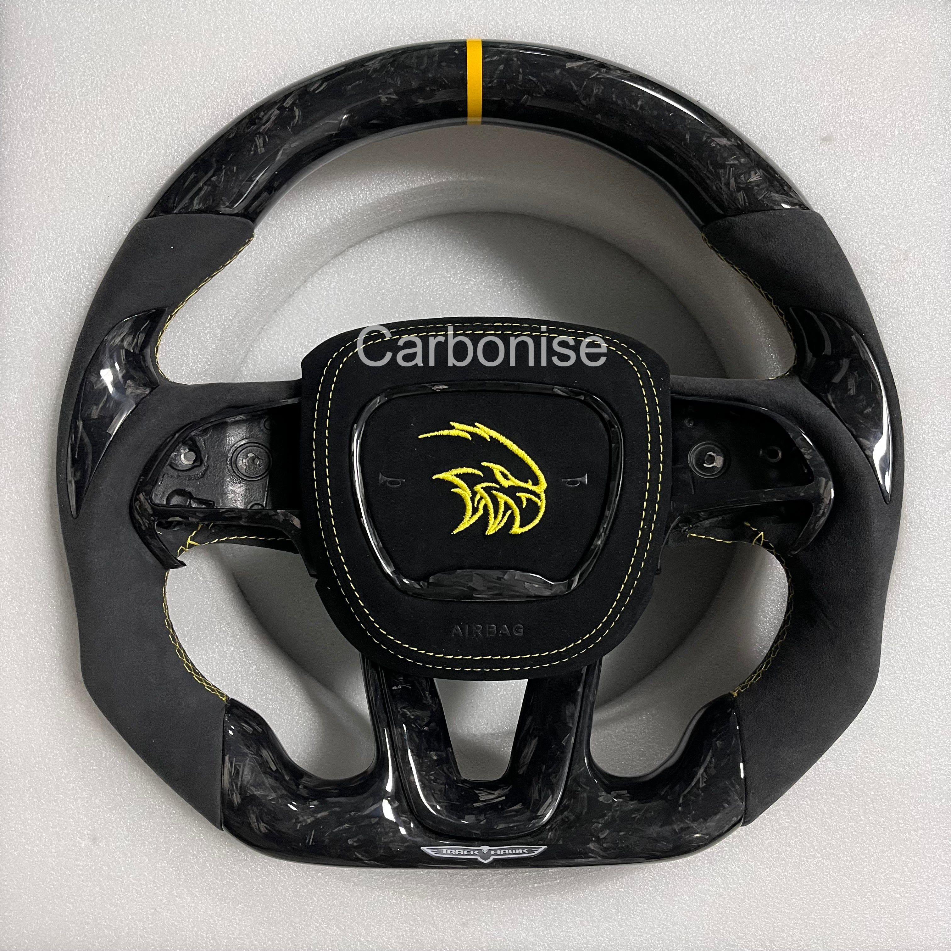 Carbonise Dodge forged carbon steering wheel with black Alcantara grip and yellow center stripe