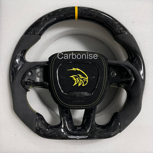 Carbonise Dodge forged carbon steering wheel with black Alcantara grip and yellow center stripe