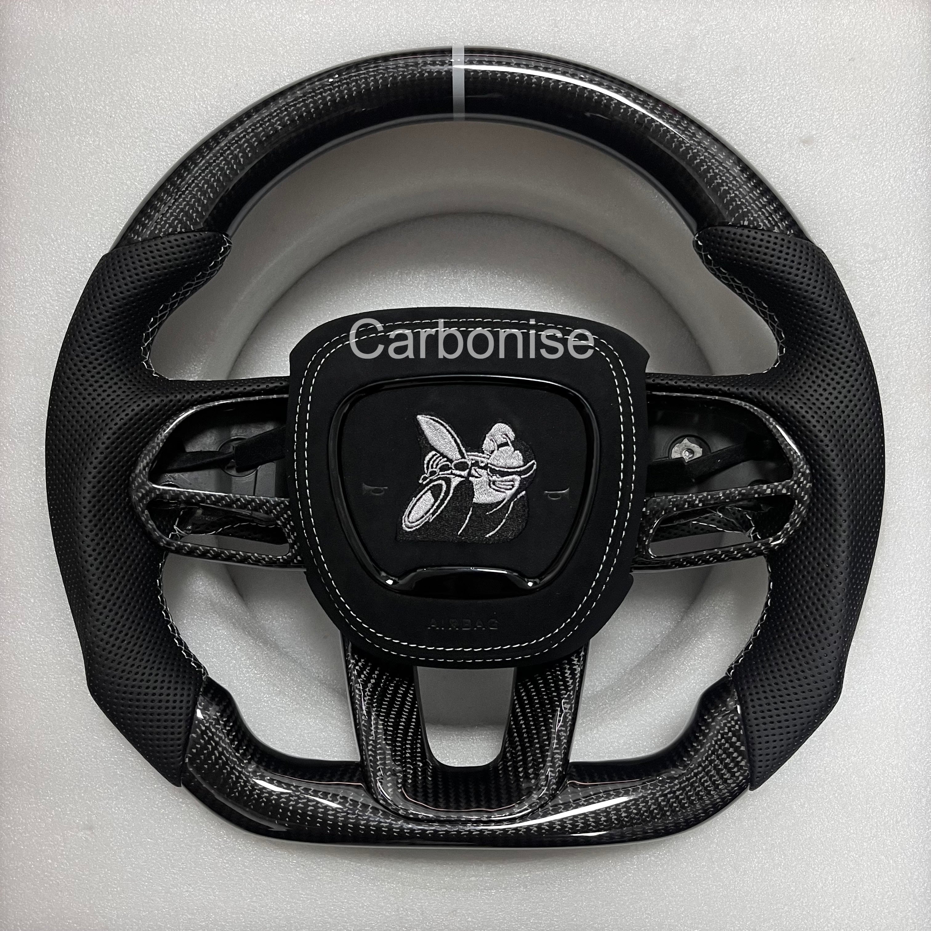 Carbonise Dodge carbon fiber steering wheel with perforated leather grip and center stripe