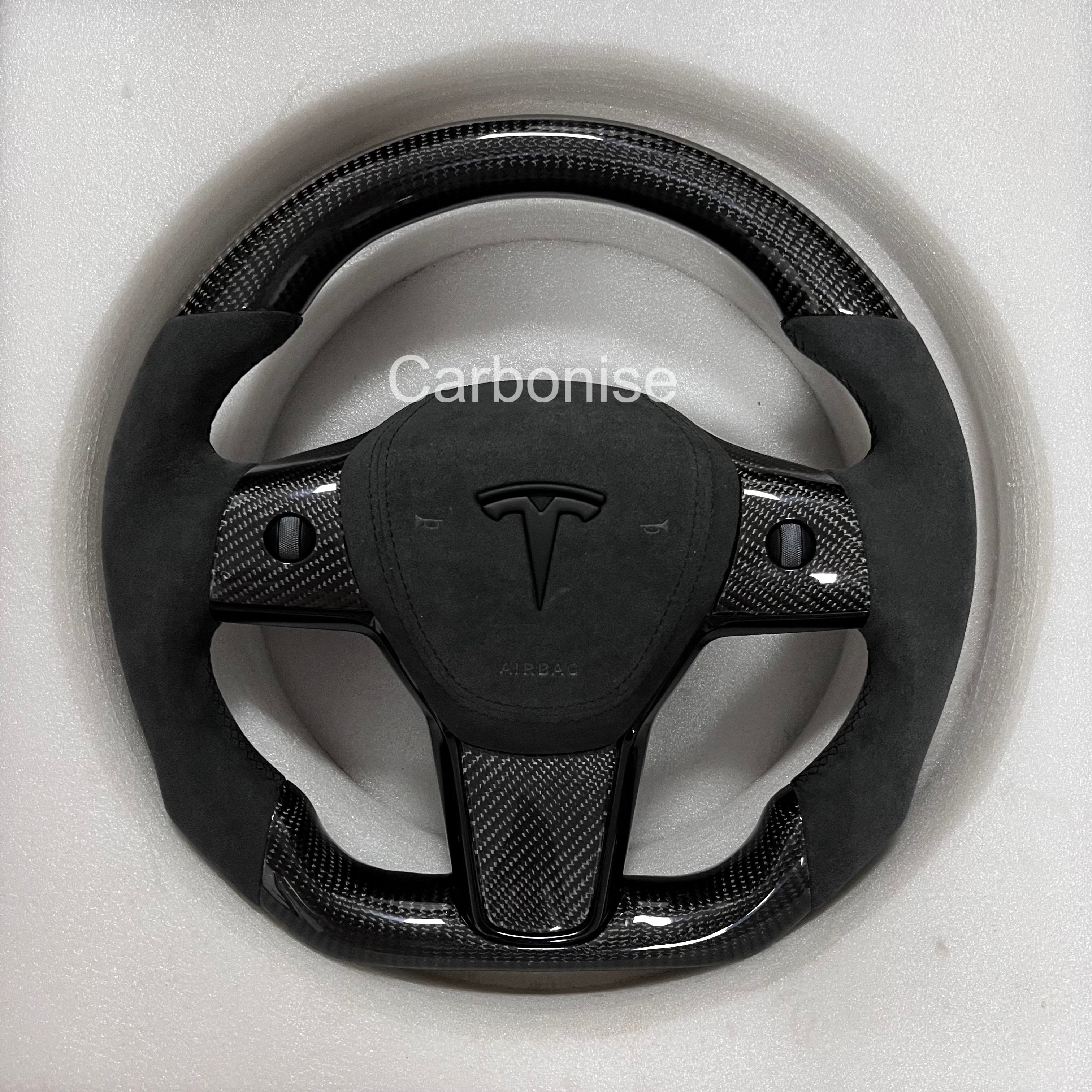 Carbonise Tesla carbon fiber steering wheel with black Alcantara grip and alcantara airbag cover