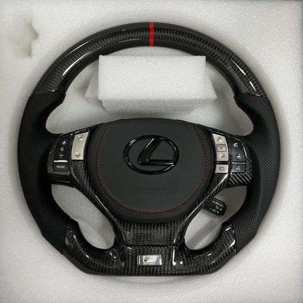 Carbonise Lexus carbon fiber steering wheel with black perforated leather grip and red center stripe