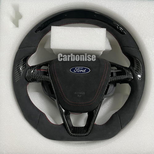 Custom Ford carbon fibre steering wheel with Alcantara grip, red stitching, flat-bottom design, and OEM Ford airbag.