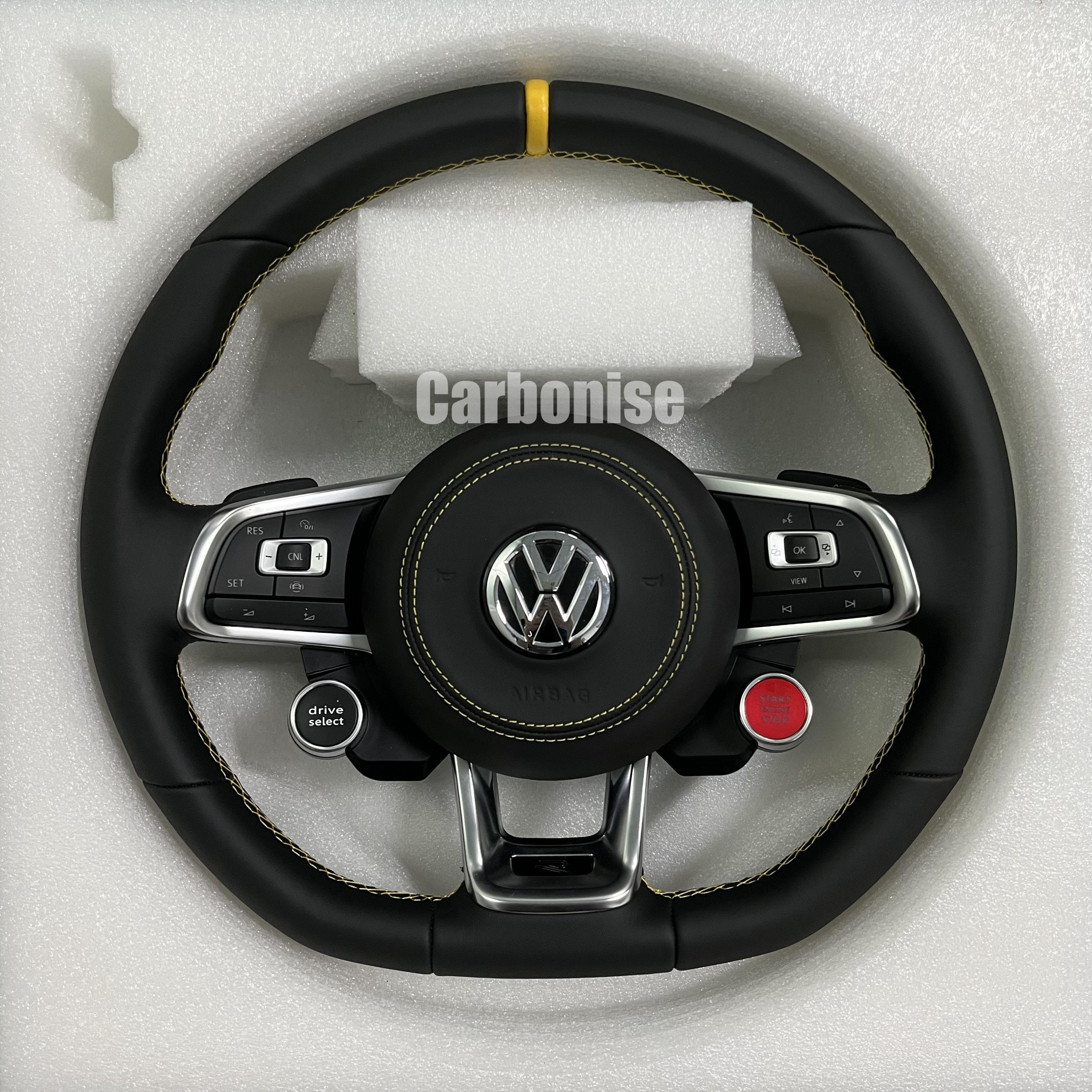 Custom Volkswagen performance steering wheel featuring a full black leather wrap, yellow top racing stripe, and integrated R8-style red start/stop buttons.