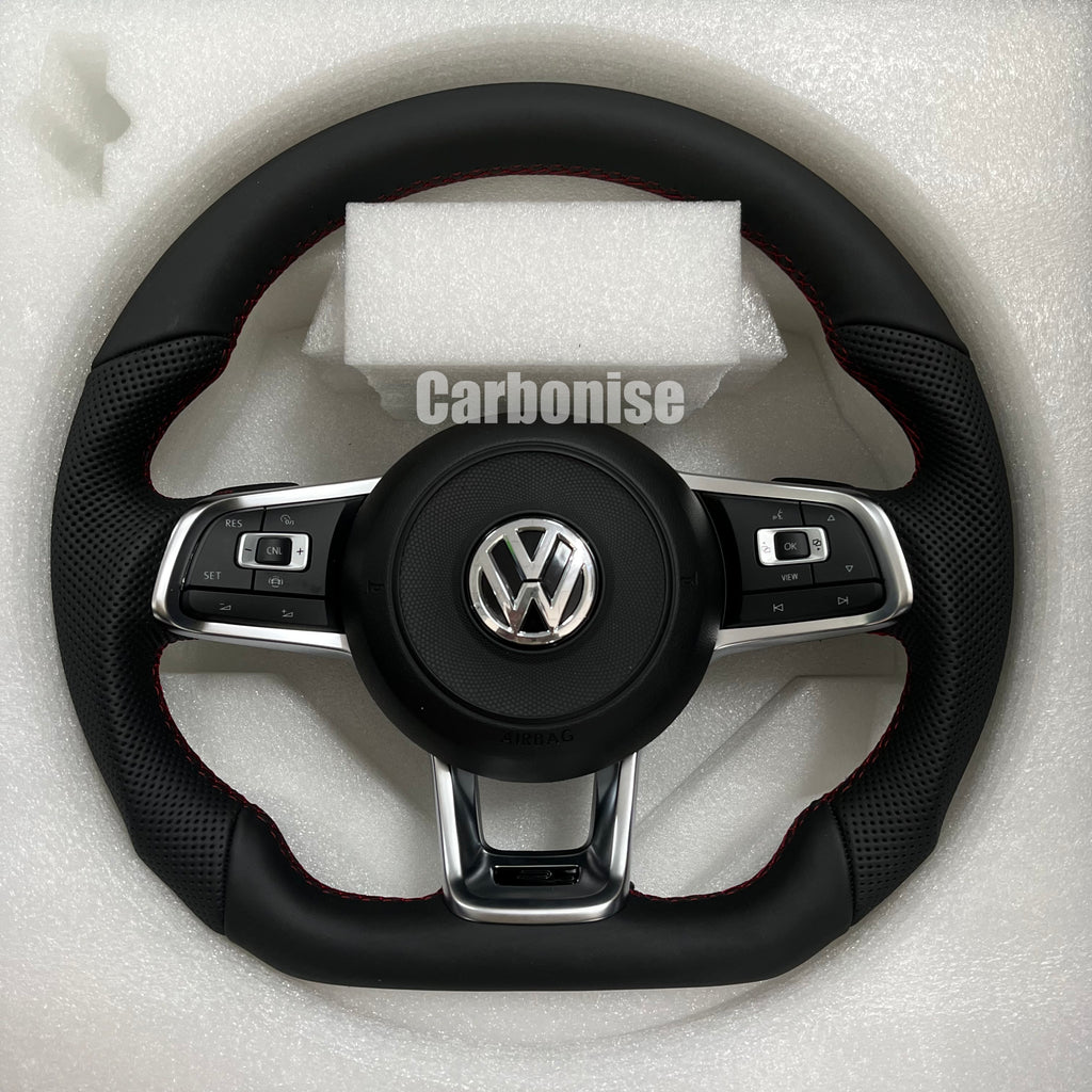 Custom Volkswagen performance steering wheel featuring a full black leather wrap, red performance stitching, and perforated leather side grips.