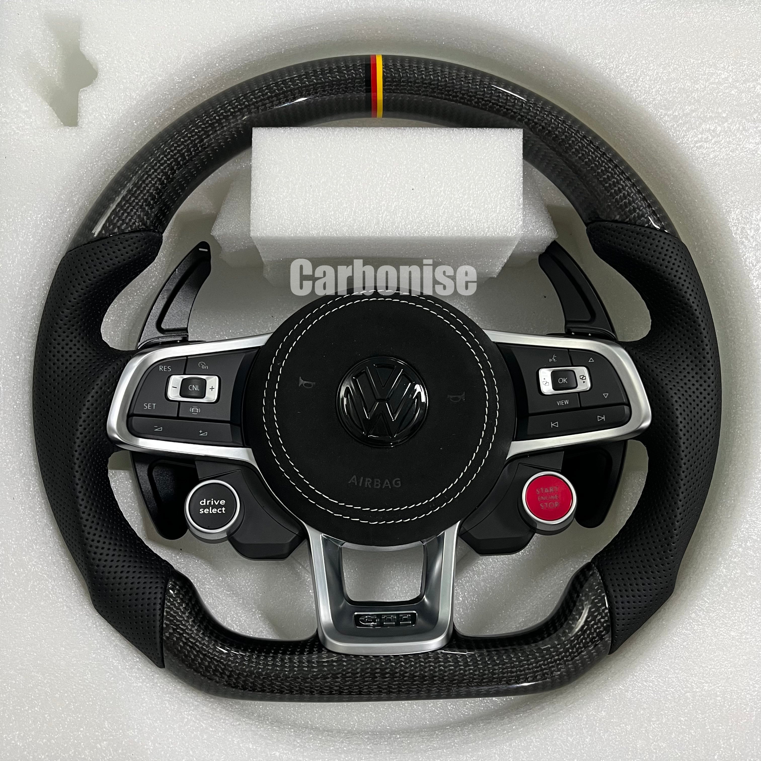 Custom Volkswagen performance steering wheel featuring high-gloss carbon fiber, a tricolor top racing stripe, and integrated R8-style red start/stop buttons.