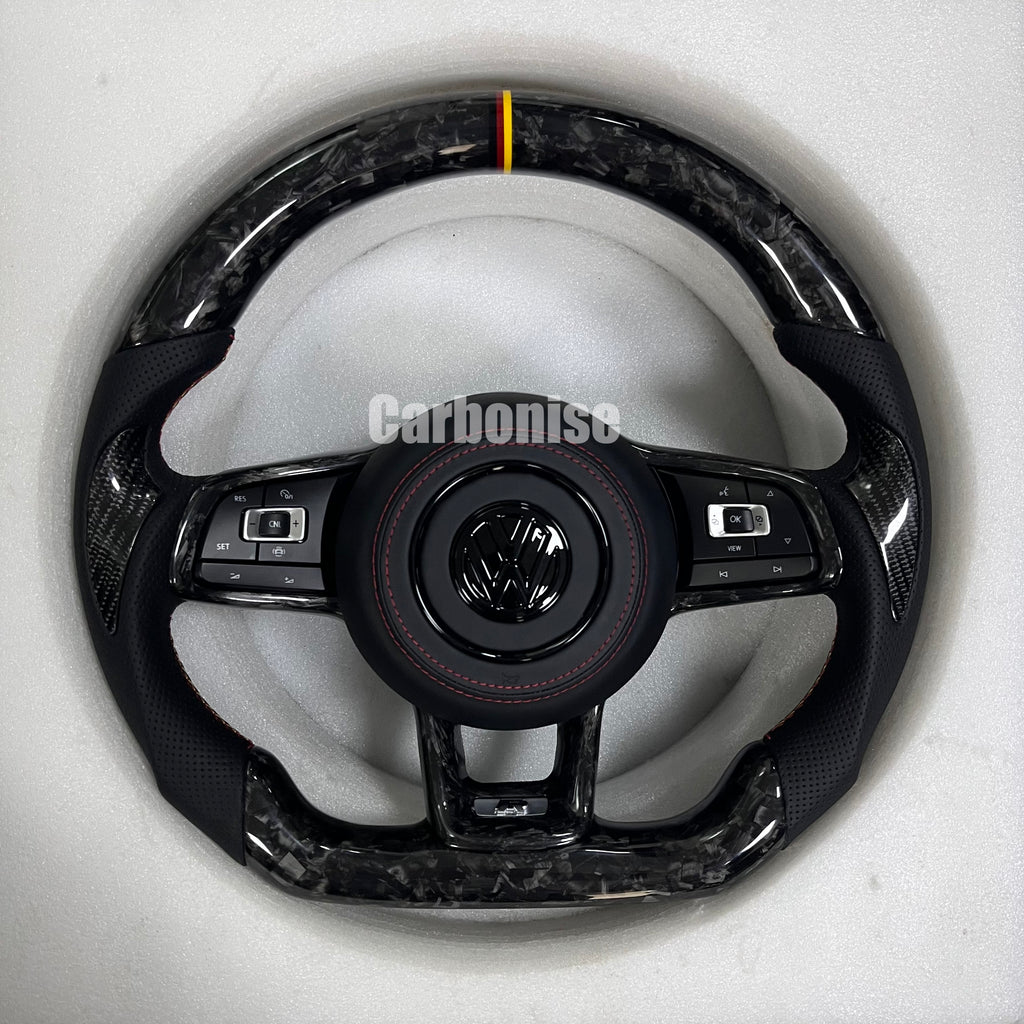 Custom Volkswagen performance steering wheel featuring high-gloss marbled forged carbon fiber, a tricolor top racing stripe, and black perforated leather side grips.