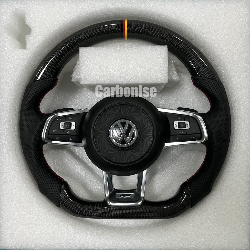 Custom Volkswagen performance steering wheel featuring high-gloss carbon fiber, a tricolor top racing stripe, and black perforated leather side grips.